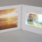 Inside, you'll notice a large 8x10 photo print framed by an elegant inside cover window. The large 10 inch screen is completely immersive, complimented by high quality stereo speakers. The hand-crafted details of these unique photo and video albums are unmatched.